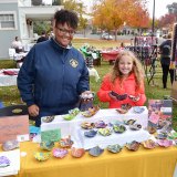 Olivia White Rochelle and daughter Mariah Brown show off their crafts as the Lemoore Sarah Mooney Museum Open House.